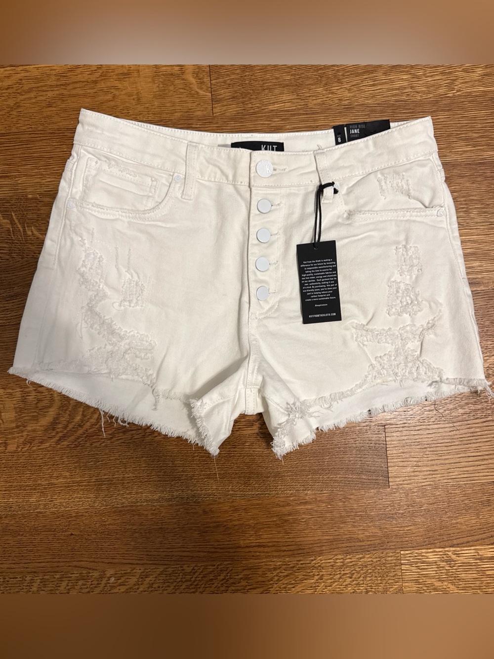 Kut from the Kloth white Distressed Button-Fly Denim Shorts. Size 8. NWT